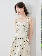 白杏色ドット柄のワンピース【フランス風・シーズンレス・スリムフィット・ロング丈】
