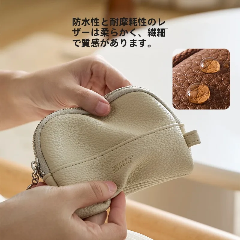 シンプルでエレガントなレザー製ミニ財布：コンパクトで実用的な小銭入れの使い方と特性