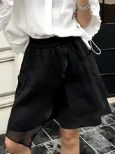 おしゃれなデザインの不規則な切り替えショートパンツ【高腰・ワイドレッグ】（セットアップ対応）