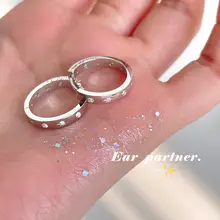 八芒星デザインの個性的なイヤリング【クールな雰囲気・フープタイプ】