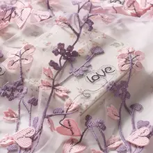 ピンクの刺繍入りメッシュレース生地【立体的なLOVE刺繍・柔らかいチャイナドレス用】