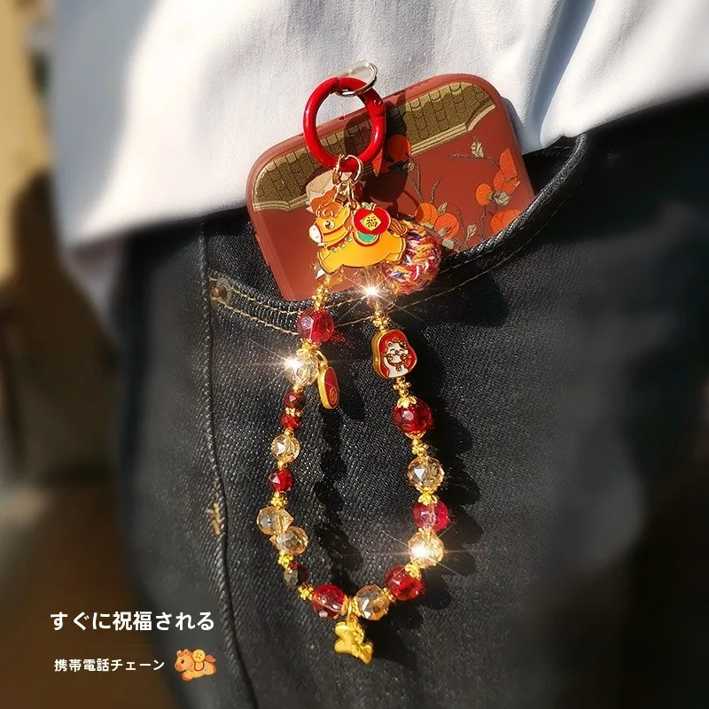 水晶金珠の招財猫スマホストラップ：アクセサリー お守りとしての実用性とデザイン特性