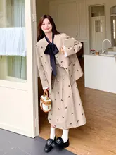 デザイン性のある優しい印象のプリント蝶結びスーツスカート【秋用・二分丈】（セットアップ対応）