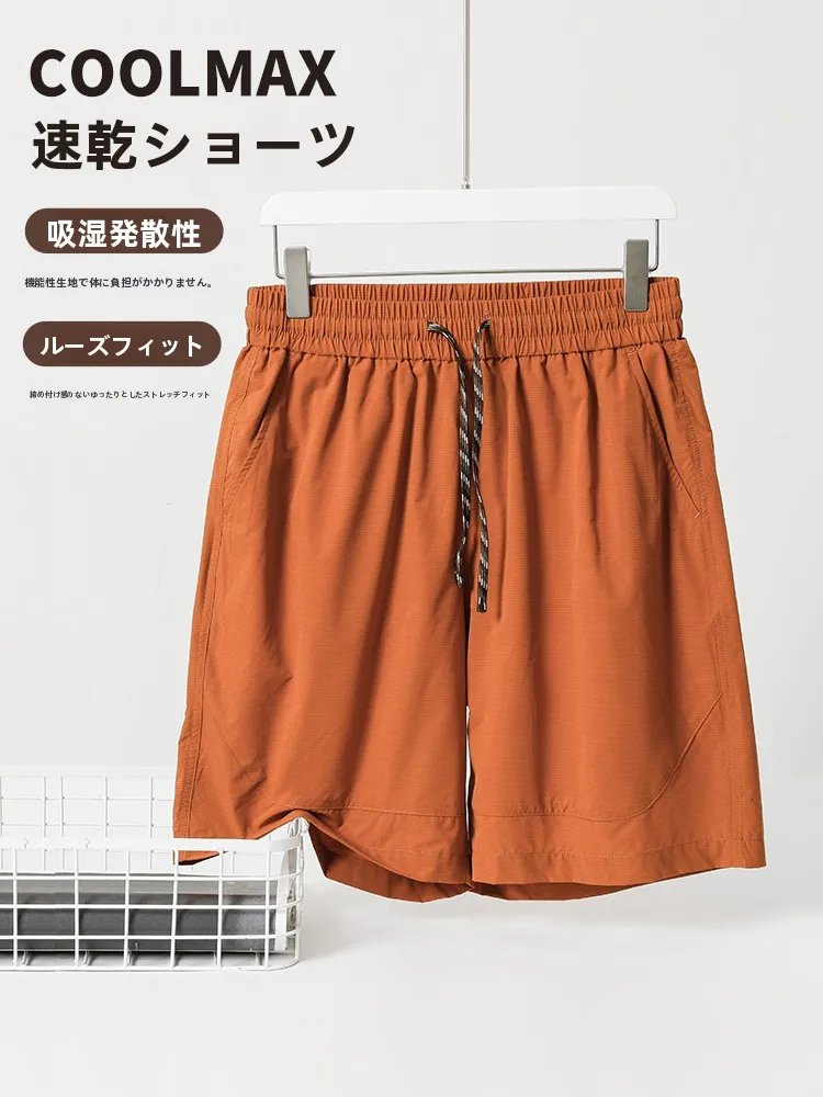 夏のショーツで暑さをどうにかする？オレンジ色の速乾ショートパンツが救うリアルな使い方
