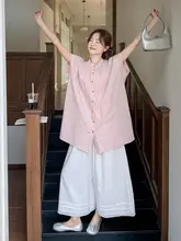 オーバーサイズ フレアスリーブ ベストとワイドパンツの春夏ファッション（セットアップ対応）
