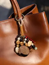 天然植物の種と果殻を使用した手編みのキーリング【バッグアクセサリー・女性向け】