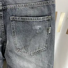 グレーのビンテージ風ダメージデニムパンツ【メンズ・ルーズフィット・秋用】