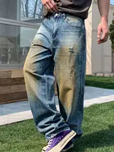 ユニークなデザインのストリートスタイルデニムパンツ【ルーズフィット・ウォッシュ加工・ダメージ仕上げ】