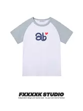 創造的なドット柄のカラーブロックTシャツ【レディース・ショートスリーブ・スリムフィット】