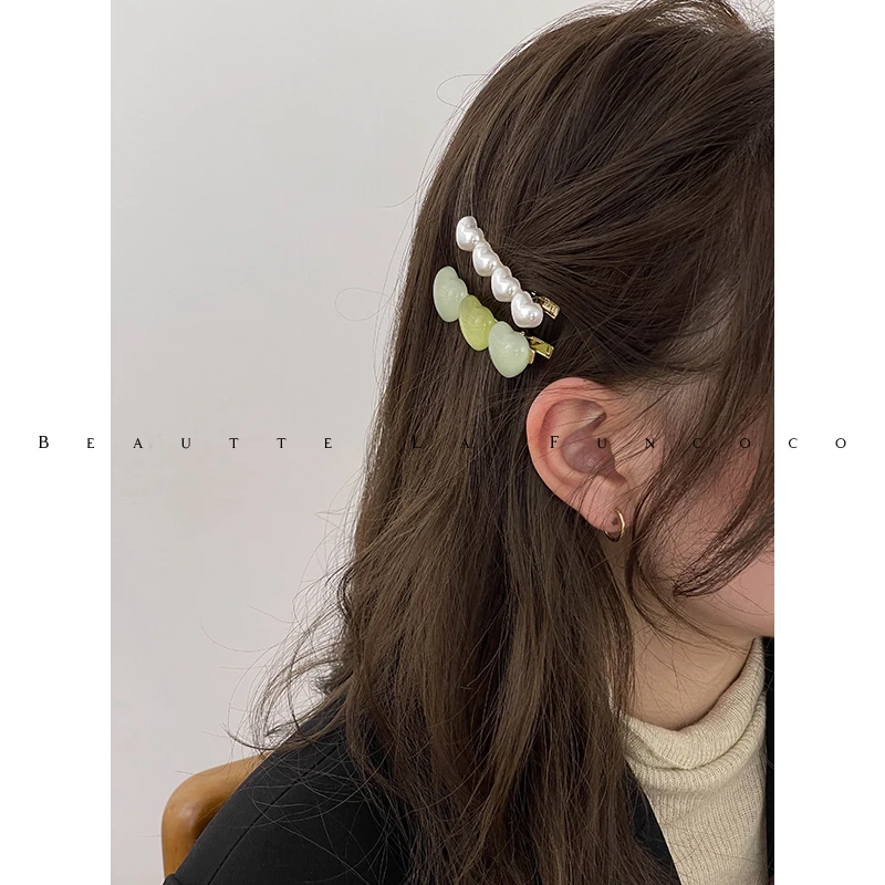 前髪斜め分けに最適なパールハートデザインサイドバングヘアクリップの使い方と特性