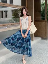 神秘的なブルーのエレガンス ホリデーコーディネート【デザイン性のある透かしタンクトップ・花柄スカート】（セットアップ対応）