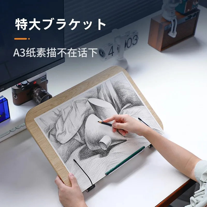 タブレットスタンドを貼り付けるのは難しい？木製の折りたたみスタンドが解決するリアルな使い方とは