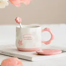 可愛い桜柄のマグカップ【フタ付き・スプーン付き・陶器・朝食用・牛乳やコーヒーに最適】
