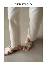 米白色 ハイウエスト デニムパンツ【スリムフィット・フリンジ仕上げ・レディース】