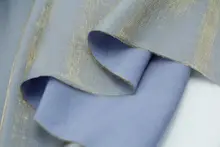 幻想的な光沢のある霧がかった青色と金色の天絲麻サテン生地【ドレス・漢服・チーパオ用】
