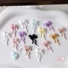 立体的な黒白のリボンデザイン爪飾り【ソフト彫刻・ダイヤモンド装飾】