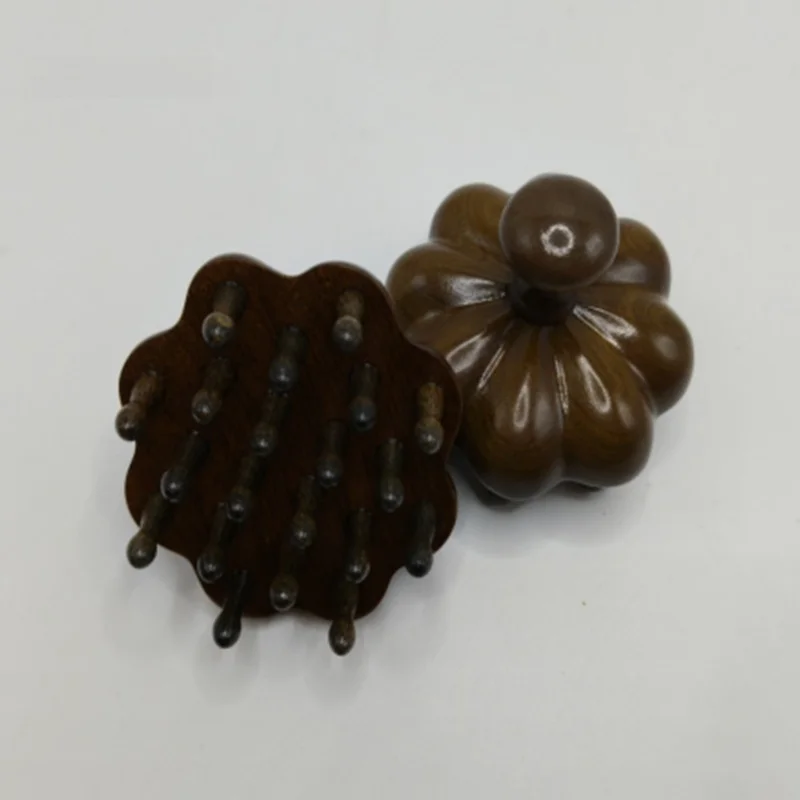 背中ツボマッサージで腰痛を和らげるには、どんなアイテムが最適？