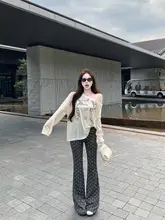 セットアップ 2点セット レディース 長袖Tシャツ ワンショルダー 結び紐 水玉柄 ルーズ カジュアルパンツ ロングパンツ 秋「kumikumi」
