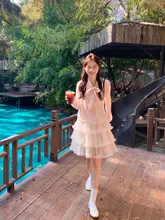 春にぴったりの長袖シャツ【ピンク・リボン付き・肌理感】