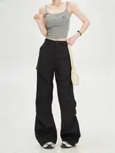 デザイン性の高い黒の高腰ストレートパンツ【シンプル・スリムフィット・女性用】（セットアップ対応）