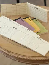 横向きデザインのポータブルノートブック【日・週・月計画用】