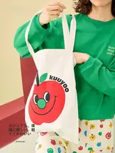 キャンバストートバッグ りんごモチーフ シンプル 軽量 大容量 カジュアル ショッピングバッグ 「KUUYOO」