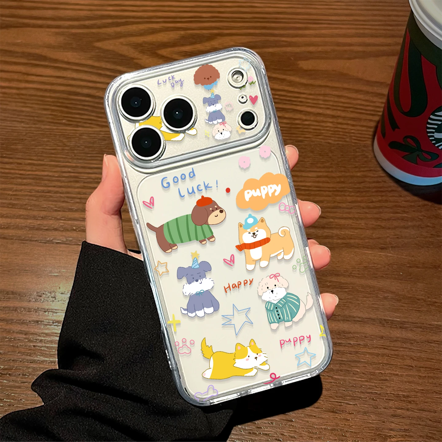 犬のイラストが可愛いiPhoneケース：透明・ブラックの子犬デザインと転倒防止機能