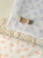 黄紫色のさくらんぼ柄のコットン生地【手作り・洋服・テーブルクロス・DIY用】