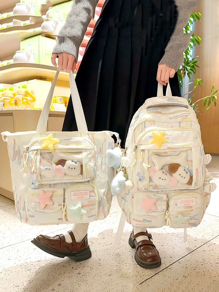 かわいいストライプのリュック：甜美学院風で軽量かつ柔らかい通学用バックの実用性解析