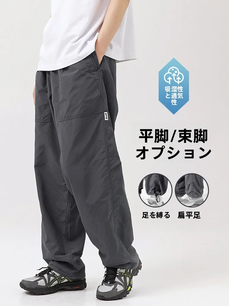 水陸両用ショートパンツ：搭念の薄手深灰色ストレートパンツが実用とファッションを両立