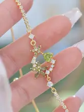 爽やかなデザイン！オリーブグリーンジルコンのイヤリング＆ネックレス＆ブレスレット【春夏用・三点式ジュエリー】（セットアップ対応）