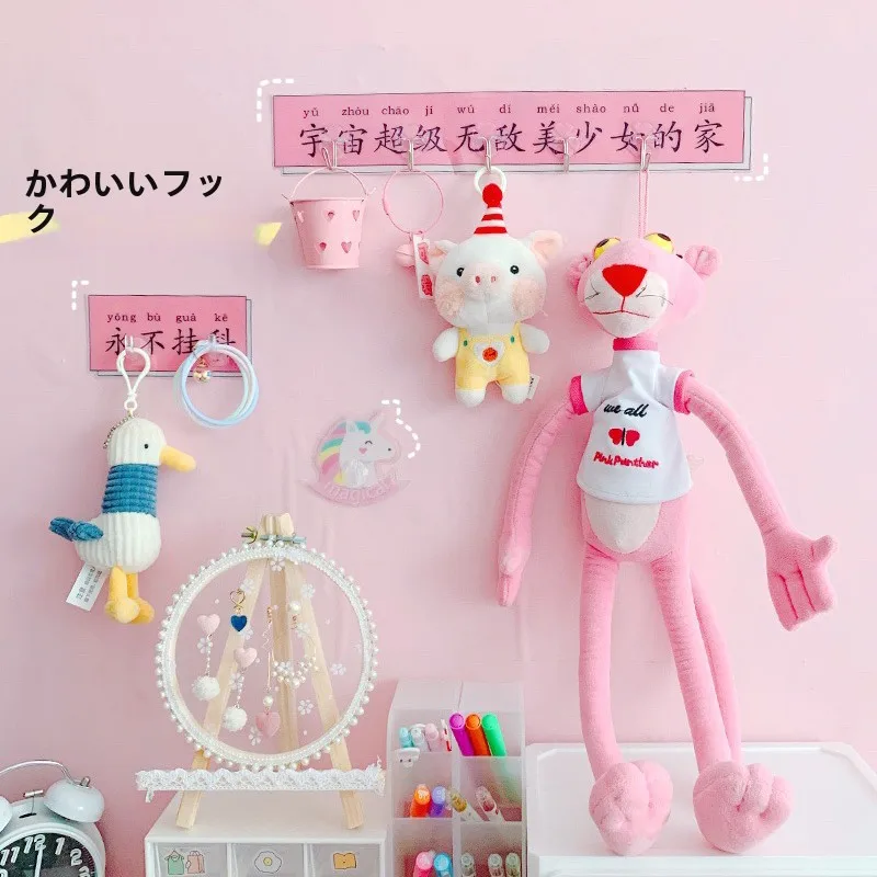 粘着式壁掛けフック：学生寮向けの貼って剥がせるフックの実用性と設置ガイド