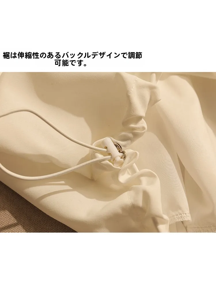 個性的デザインの白いノースリーブブラウス：夏用の肩掛けスタイルとゆったりフィット感を実現