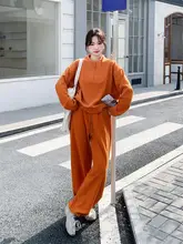 春秋用オレンジのスウェットシャツとワイドパンツ【カジュアル・スポーツウェア】（セットアップ対応 ）