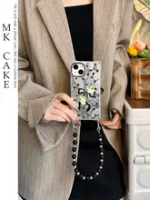 リボン付きドット柄フェザー風iPhone用ケース【斜め掛け可能・チェーン付き・衝撃吸収】