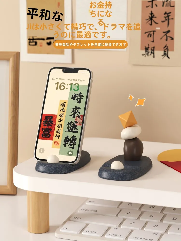 海貝デザインのスマートフォンスタンド：小众アートと日常送礼の融合
