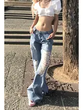 アメリカンヴィンテージスタイルのブルー・ローウエスト・ダメージ入りワイドレッグデニムパンツ【夏用・シルエット】