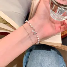 重ね付けできるパールリボンブレスレット【上品・学生向け・ギフトに最適】