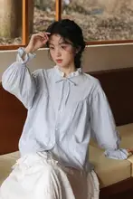 春にぴったり！ストライプデザインのリボン付きシャツ【甘くてゆったり・フリルエッジ】