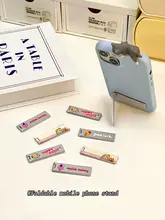 スマートフォンスタンド 背面取り付け デスク用 可愛い コンパクト 携帯 製 折りたたみ 超薄型 隠し 支え
