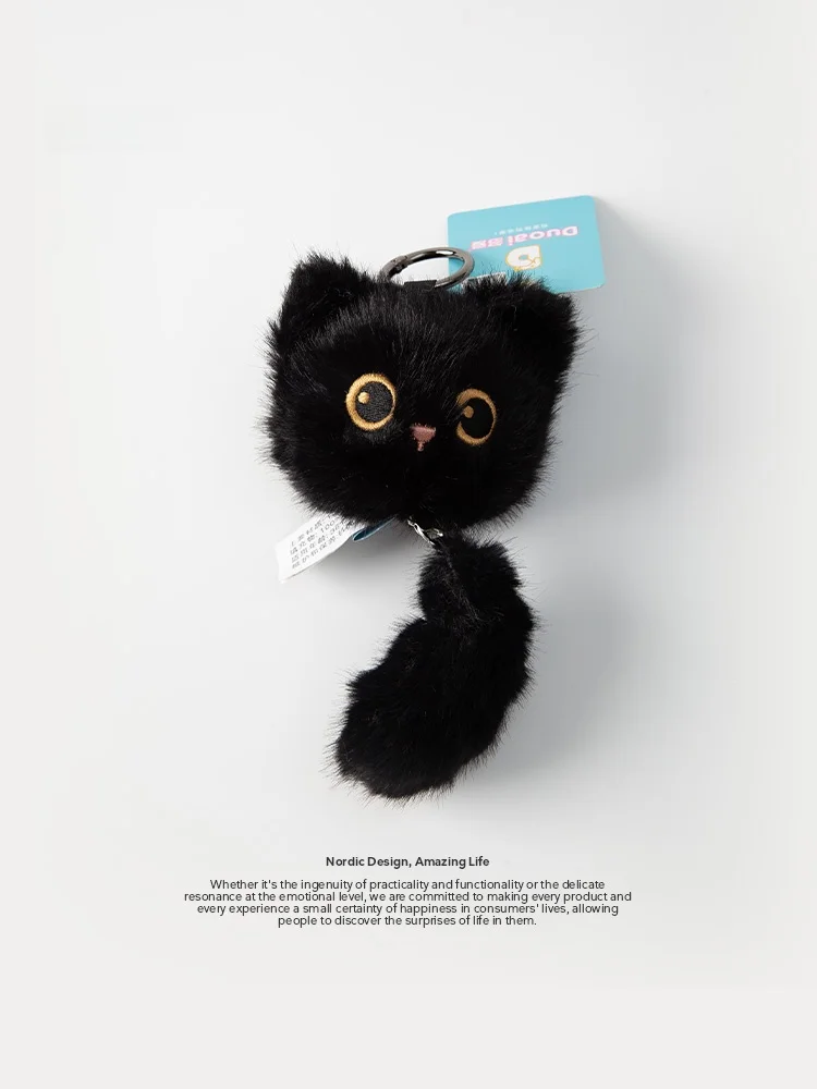 座り猫のぬいぐるみキーホルダー：猫用小物プレゼントとしての実用性とデザインのバランス