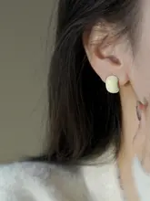 デザイン性の高いモスキートコイル型イヤリング【耳穴不要・ドロップ釉・秋冬用】