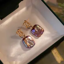 クラシックなバロック風の天然パールバックルピアス【エレガントデザイン・女性用】