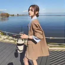 カキ色カジュアルスーツ【女性用・ショートスカート・気品漂うデザイン】（セットアップ対応）