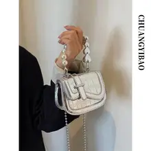 高級感あるミニショルダーバッグ【チェーンデザイン・可愛らしいサドルバッグ】