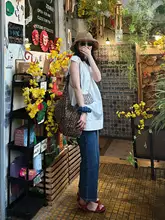 春夏にぴったりなカジュアルコーディネート【白のショートスリーブシャツ・ゆったりデニムパンツ】（セットアップ対応）