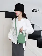 ファッショナブルでカジュアルな多ポケットハンドバッグ【軽量・防水・シンプルデザイン・高品質スマホポシェット】