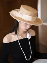 春夏用 レディースハット【平頂デザイン・ホワイト・大きなリボン付き・UVカット】