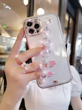 iPhone14用 ラグジュアリー手帳型ケース【全包デザイン・クリスタルブレスレット付き・透明】