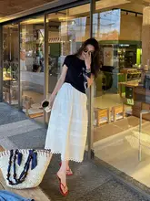 フラワーエッジのテクスチャー感が魅力の白いAラインスカート【女性用・ロング・フランス風】（セットアップ対応）